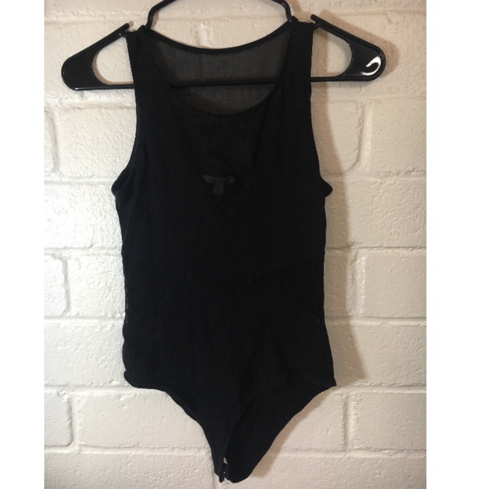 ✨ Black bodysuit with mesh cutouts on sides ✨